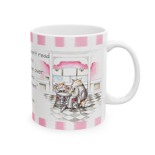 Kitty Fun Mug “The man who doesn’t read…”